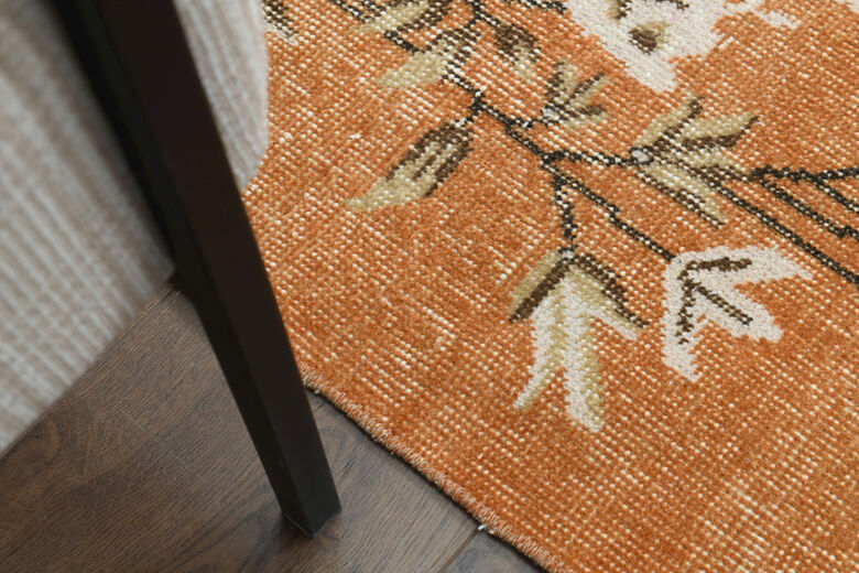 Distressed Orange Floral Rug