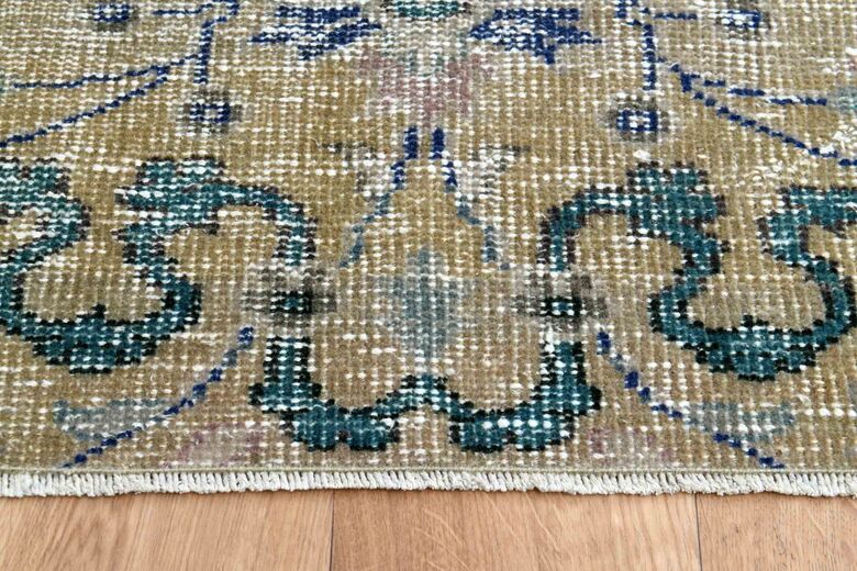 Faded Yellow Antique Turkish Rug